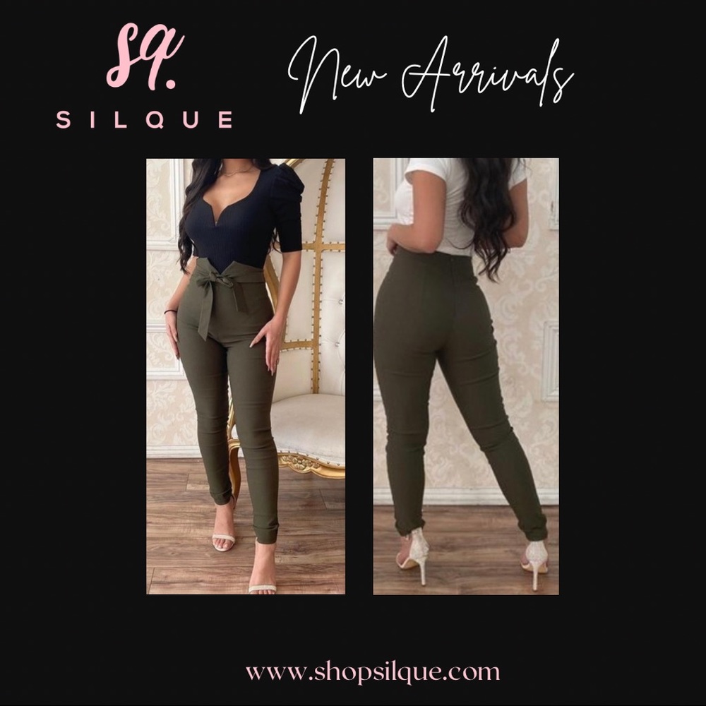 Green skinny leg trousers with tie belt